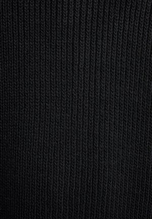 Tessuto di maglia nera con una texture a coste verticali. Il materiale è morbido e compatto, caratterizzato da costole parallele e ravvicinate.