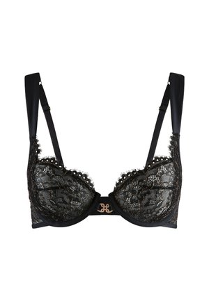Black lace bra featuring intricate floral patterns, underwire support, and decorative scalloped edges. Includes adjustable satin straps.