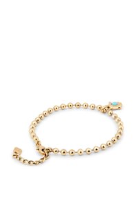 Pulsera de cuentas en tono dorado con un acento de turquesa y un pequeño charm en forma de mano. Cuenta con un broche y una cadena ajustable para el tamaño.