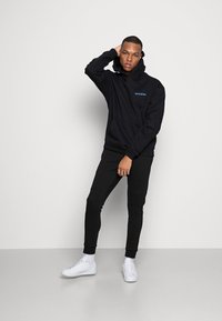 Antony Morato TROUSERS SUPER  - Calças de fato de treino - black