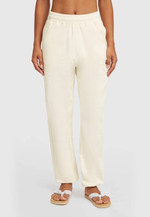 Light cream jogger pants with an elastic waistband and side pockets, featuring a relaxed fit and smooth cotton-blend fabric.