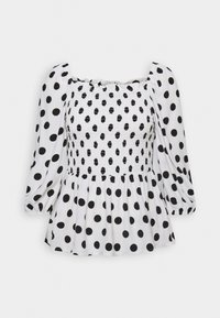 Blusa branca com bolinhas pretas, decote quadrado, corpete franzido e mangas longas bufantes. Feita de tecido leve, com barra evasê.