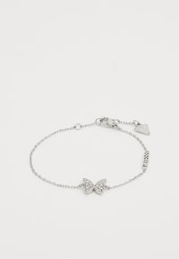 Silver chain bracelet featuring a butterfly charm with embedded rhinestones and a small logo tag. Adjustable clasp for sizing.