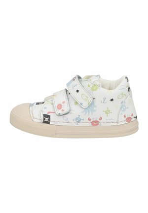 White children's sneaker with nautical-themed prints, two Velcro straps, beige rubber sole, and rounded toe.