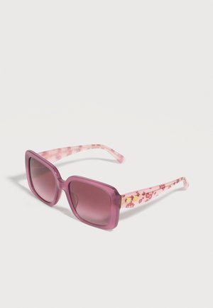 Lunettes de soleil carrées violettes avec verres dégradés et branches roses à motifs floraux, avec deux petits clous dorés de chaque côté.