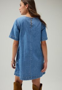 Next Teksakleit - mid blue