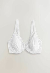 Soutien-gorge blanc à armatures avec détails en mesh sur les bonnets et bretelles réglables, posé à plat sur un fond clair.