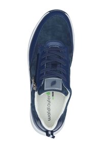 Navy blue sneaker featuring a mix of suede and synthetic materials, contrasting white sole, laces, and zipper for easy wear.