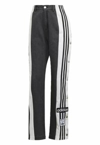 Svarta denimbyxor med vita sidopaneler med tre svarta ränder, tryckknappar längs benen och en Adidas-logopatch.