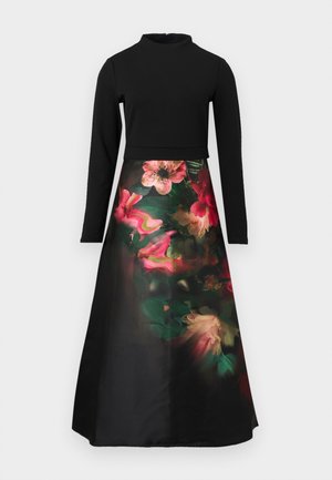 Vestido preto de mangas longas com decote alto, cintura ajustada e saia fluida apresentando um vibrante padrão floral em rosa e verde.