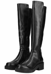 Botas negras de imitación cuero hasta la rodilla con una superficie lisa, cremallera lateral y suela de plataforma negra y gruesa.