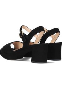 Zwarte suède platform sandalen met een open teenontwerp, verstelbare enkelband en blokhak. Soepele textuur met een minimalistisch design.