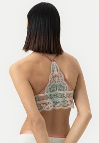 Lace bralette with floral patterns in pastel blue and pink, finished with delicate lace trim and a soft satin band in a coral hue.