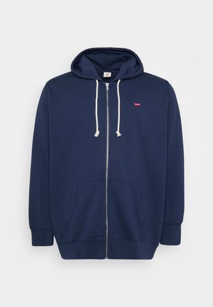 Marineblauwe rits-hoodie van een katoenmix met een trekkoordcapuchon, voorzakken en een klein rood logo op de borst. Zachte textuur.