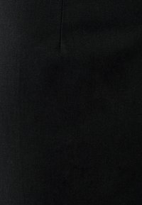 TUSSAH Kalhoty - black