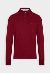 Pánská polokošile s dlouhým rukávem v burgundské barvě z bavlny, se klasickým límcem, zapínáním na knoflíky a malým logem na hrudi.