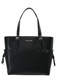 Sac cabas en cuir noir Michael Kors avec doubles bretelles, boucles argentées et détails à cordon latéraux.