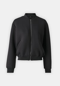 Čierna bomber bunda vyrobená z mäkkej tkaniny, s predným zipsom, rebrovanými manžetami a bočnými vreckami, s voľným strihom.