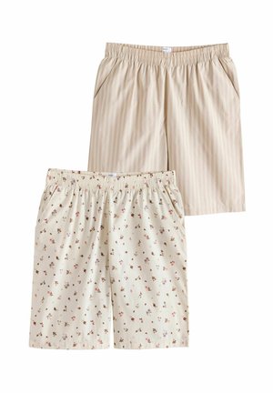 Twee paar shorts met elastische taille, één beige met subtiele verticale strepen, de andere crème met kleine bloemenprint, beide met zijzakken.