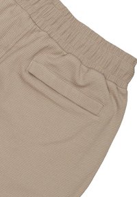 Beżowe, prążkowane spodnie dresowe z elastycznym pasem i jedną tylną kieszenią z płaskim zapięciem. Miękka tekstura i prosty design.
