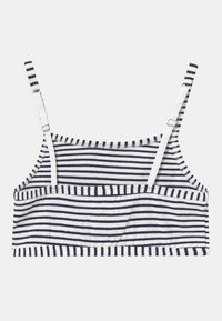 Bralette cu dungi navy și albe, realizat dintr-un material de bumbac moale, cu bretele ajustabile și un design fără cusături. Fără padding sau sârme.