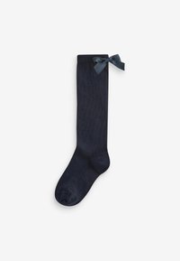 Calze al ginocchio blu navy realizzate in un morbido tessuto testurizzato, con un dettaglio a fiocco in satin sulla parte superiore per un tocco aggiuntivo.