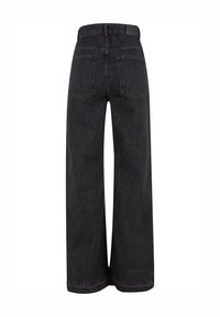Schwarze weit geschnittene Jeans aus robuster Denim-Qualität, mit einer mittelhohen Taille, zwei Gesäßtaschen und einem sauberen Saum ohne sichtbare Beschläge.
