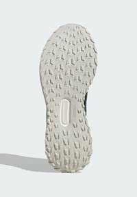 Suela exterior de zapato con patrón de banda de rodadura texturizado, material de goma blanca, que presenta un recorte ovalado y la marca ADIWEAR cerca del talón.