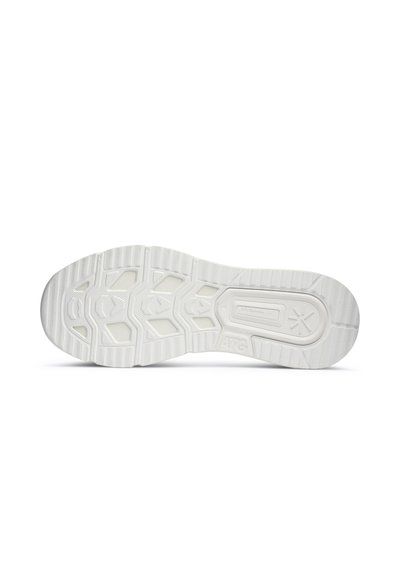 Semelle en caoutchouc blanche avec des motifs texturés, présentant des designs hexagonaux et en vagues, incluant un logo embossé au centre.