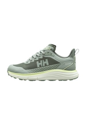 Scarpa da ginnastica verde chiaro e grigia con lati in rete, suola spessa bianca, lacci e logo "HH" sul lato e sulla linguetta.