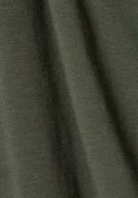 Dark green fabric with a smooth texture and fine ribbed pattern, displaying soft folds and a lightweight appearance.