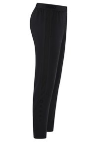 Pantaloni sportivi neri con un pannello laterale testurizzato, vita elasticizzata e dettagli a bottoni sulla parte inferiore sinistra. Realizzati in un materiale leggero e flessibile.