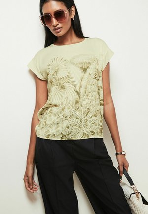 Next SHORT SLEEVE - REGULAR FIT - Blouse - ecru and green leaf print