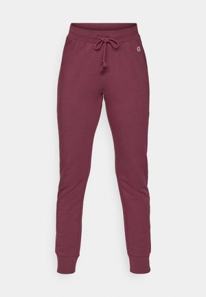 Bordeauxfarbene Jogginghosen aus weichem Material mit einem Kordelzugbund, gerippten Bündchen und einem kleinen Logo-Detail an der Hüfte.