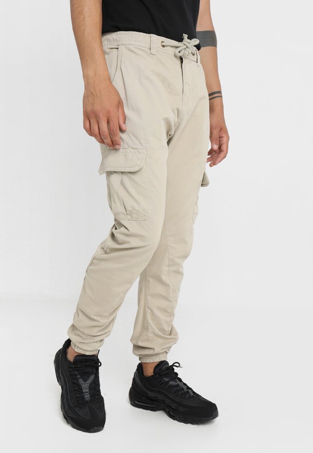 Pantalons cargo homme beige Tous les articles chez Zalando