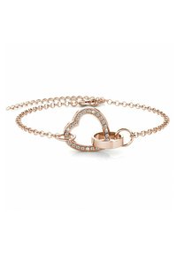 Bracciale in oro rosa con ciondolo a forma di cuore decorato con cristalli trasparenti, collegato da una delicata catena. Il ciondolo include un dettaglio a forma di anello.