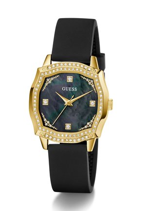Goudkleurig achthoekig horloge met een donkergroene steen dial, zwarte siliconen band en diamantenachtige accenten op de kast en het gezicht.