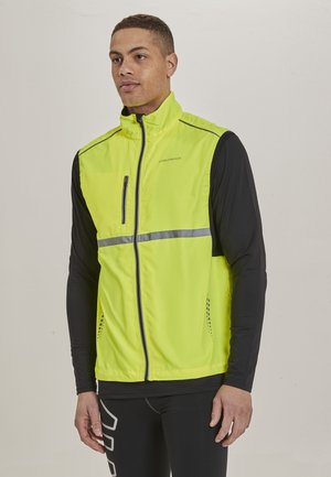 MIT ATMUNGSAKTIVER EIGENSCHAFT - Waistcoat - neon yellow