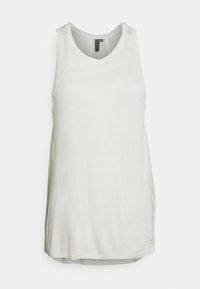 Světlé béžové tílko bez rukávů vyrobené z měkké, lehké tkaniny s kulatým výstřihem a volným střihem. Proužky švů po stranách.