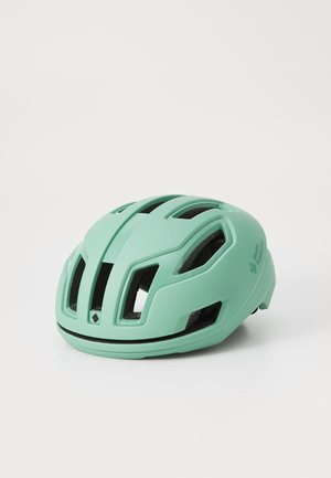 Casco de ciclismo en verde menta con múltiples ventilaciones, un acabado mate suave y una correa ajustable para un ajuste seguro. Diseño ligero y aerodinámico.
