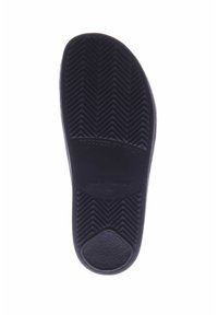 Black rubber shoe insole with a textured anti-slip surface and a chevron pattern. Markings indicate it is made in Germany, size 38.