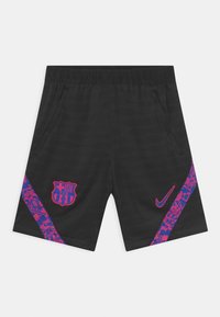 Pantaloni sportivi neri con strisce a motivi rosa e blu, con il crest del FC Barcelona a sinistra e il logo Nike rosa a destra.