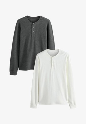 Kaks pikka varrukatega henley särk: üks tumehall ribakanga с kolm nööpi, teine valge ribakanga с kolm nööpi.