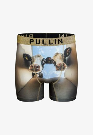 Boxer imprimé motif vache noir et blanc avec une ceinture élastique dorée portant l'inscription "PULLIN." Le tissu semble lisse et extensible.
