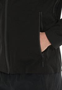 Endurance KOMINT - Runningjack -  black
