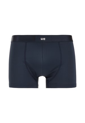 Marineblauwe boxershorts met een gladde textuur, elastische tailleband en contrasterend logo. Kenmerken een aansluitend ontwerp en een lengte tot halverwege de dij.