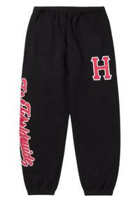 Sorte sweatpants lavet af bomuld, med elastisk talje, sidelommer og fed rød skrift på venstre ben og højre lår.