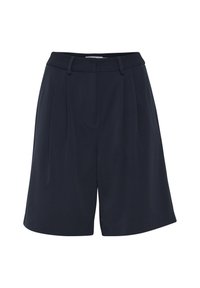 Pantalones cortos de sarga azul marino con cintura alta, pliegues y bolsillos laterales. Tejido suave con un ajuste estructurado y líneas limpias.