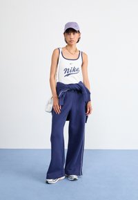 Nike Sportswear PANT - Treniņtērpa apakšdaļas - midnight navy