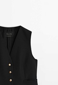 Gilet noir sans manches avec un décolleté en V profond, trois boutons dorés et poches latérales, étiqueté Massimo Dutti.
